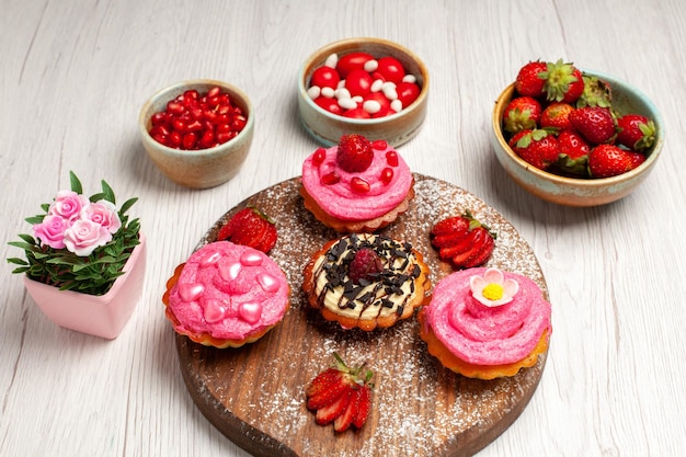 Front view delicious fruit cakes creamy desserts with fruits on white background cream cookie dessert sweet cake tea