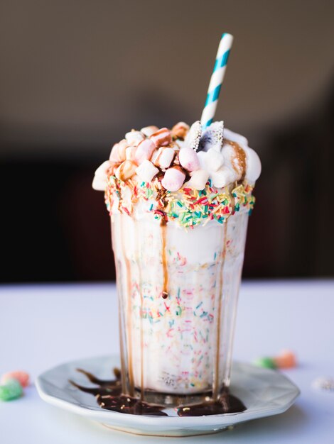 Front view of delicious milkshake on plate