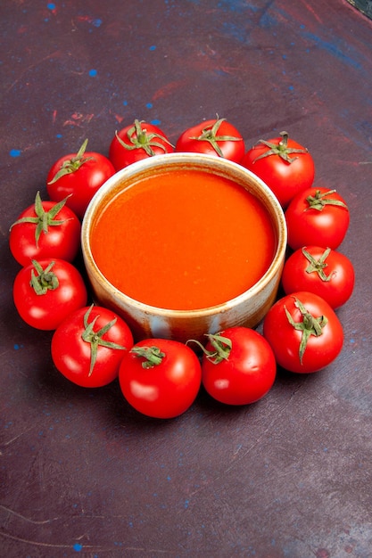 Free Photo front view delicious tomato soup with fresh red tomatoes on dark space