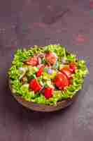 Free photo front view delicious vegetable salad sliced food with fresh ingredients on a dark space