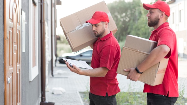 Front view of delivery man with packagaes