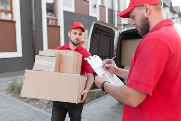 Front view of delivery men at job concept