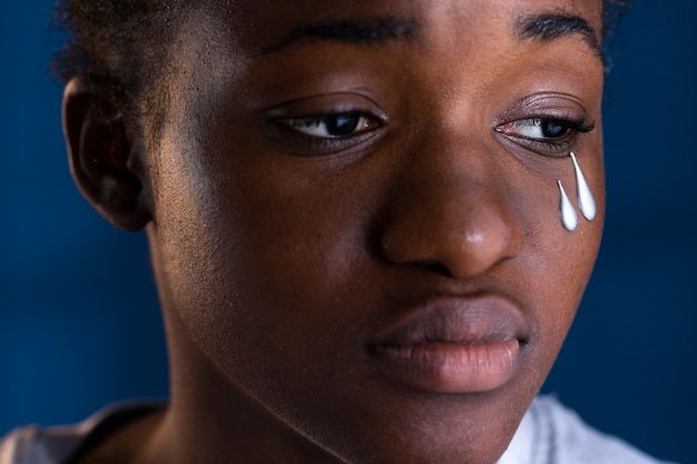 Free photo front view depressed woman at home