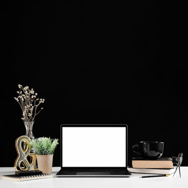 Free photo front view of desk concept with copy space