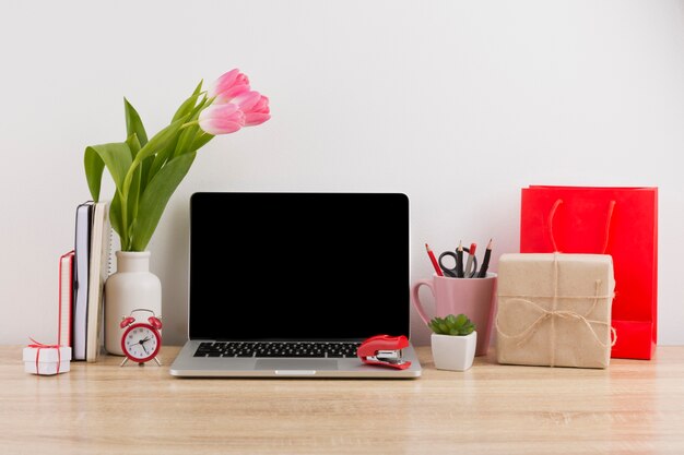 Front view of desk concept with tulips