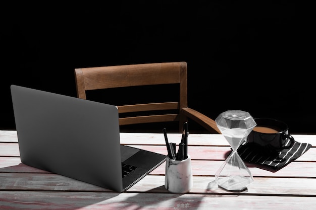 Free photo front view of desk concept on wooden table