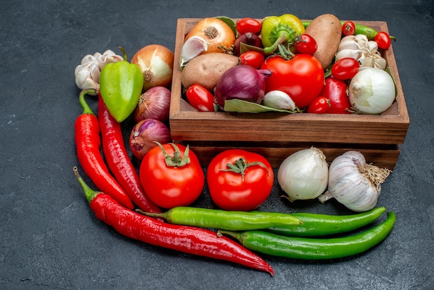 Front view different fresh vegetables on dark table fresh ripe color salad