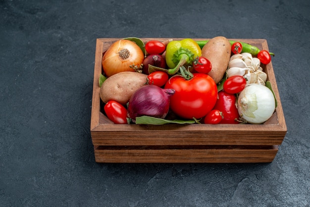 Front view different fresh vegetables on dark table vegetables fresh salad ripe