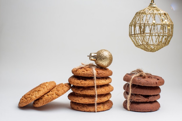 Free Photo front view different tasty biscuits on the white background