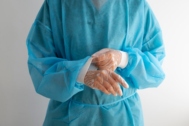 Free Photo front view  doctor wearing medical gown