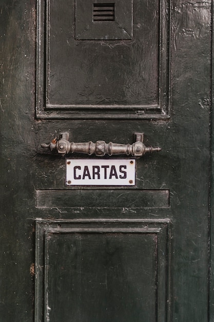 Free photo front view of door of city building