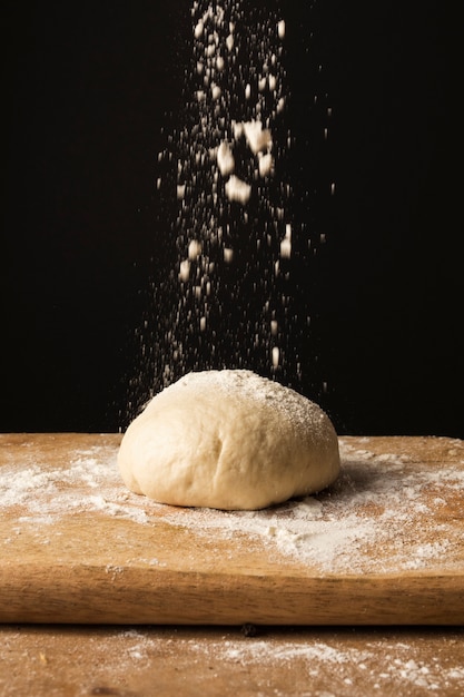 Front view dough on cutting board