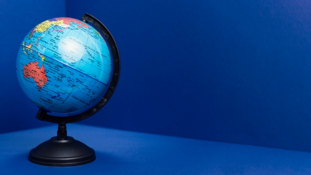 Front view of earth globe with copy space