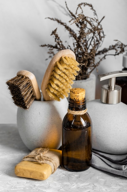 Front view of eco-friendly cleaning products set with brushes and soap