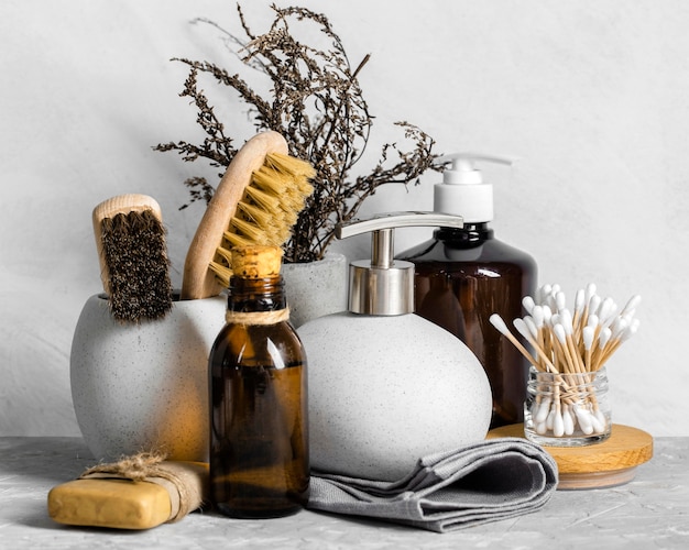 Front view of eco-friendly cleaning products set with cotton swabs and soap