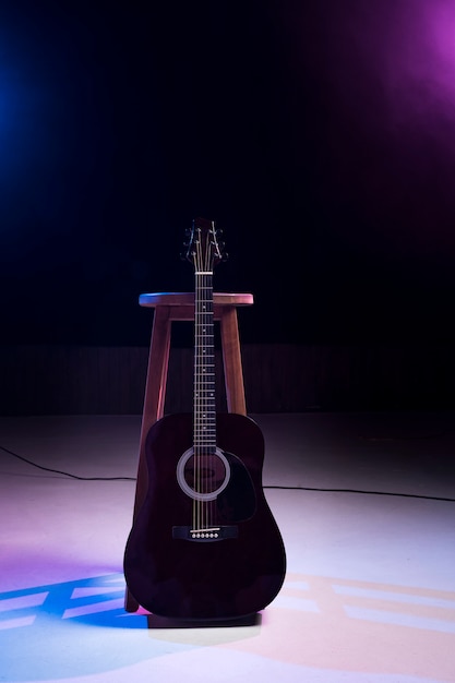 Front view electric-acoustic guitar on stage