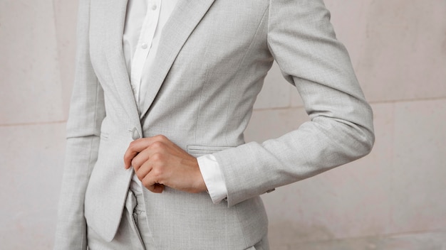 Front view of elegant businesswoman in suit