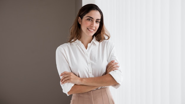 Free Photo front view of elegant businesswoman