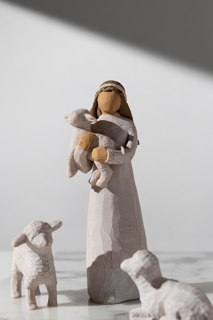 Free Photo front view of epiphany day female figurine with sheep