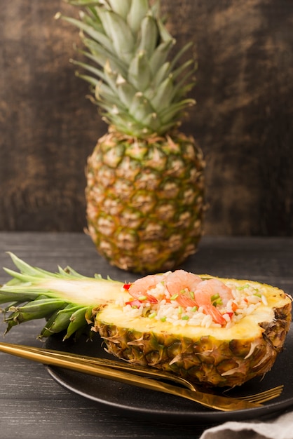 Free photo front view exotic pineapple and shrimps