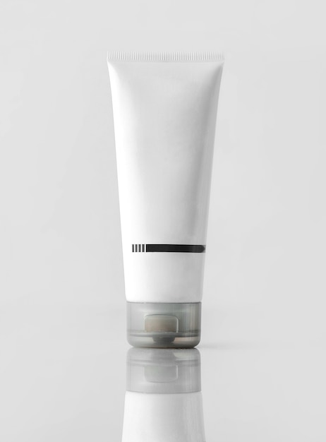 A front view face cream white isolated on the desk