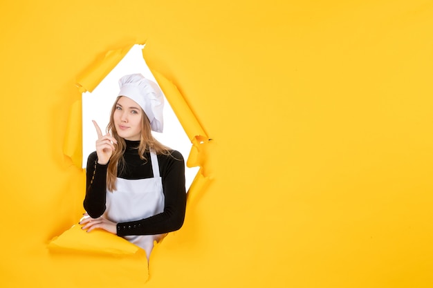 Front view female cook on yellow color sun photo cuisine emotion food job