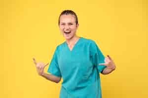 Free photo front view female doctor in medical shirt, covid-19 health hospital virus nurse