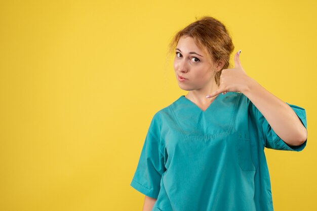 Front view female doctor in medical shirt, health medic covid color hospital nurse