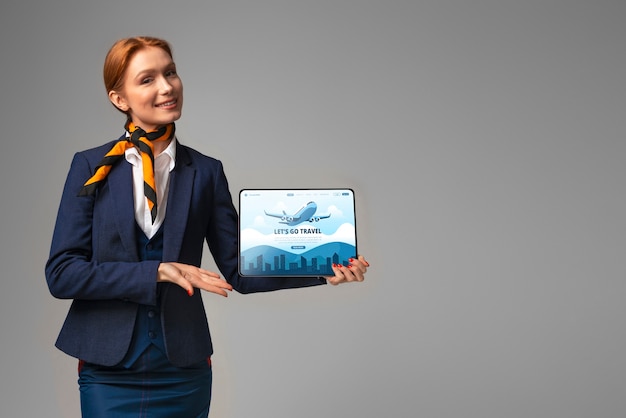 Free Photo front view female flight attendant in studio