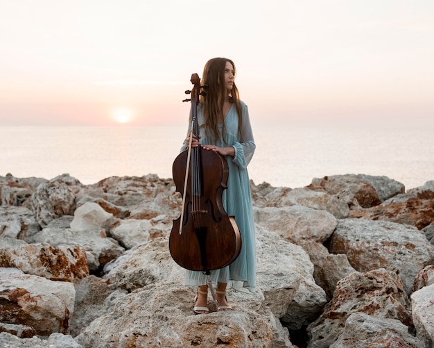 Front view of female musician with cello