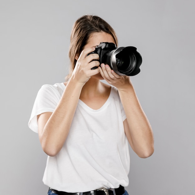 Front view of female photographer