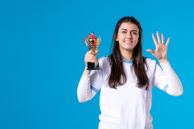 Front view female player with trophy