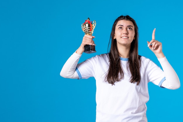 Free Photo front view female player with trophy