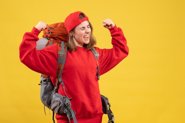 Free Photo front view female traveler with backpack expressing her feelings