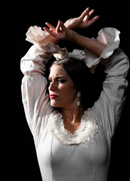 Free Photo front view flamenca with hands crossed