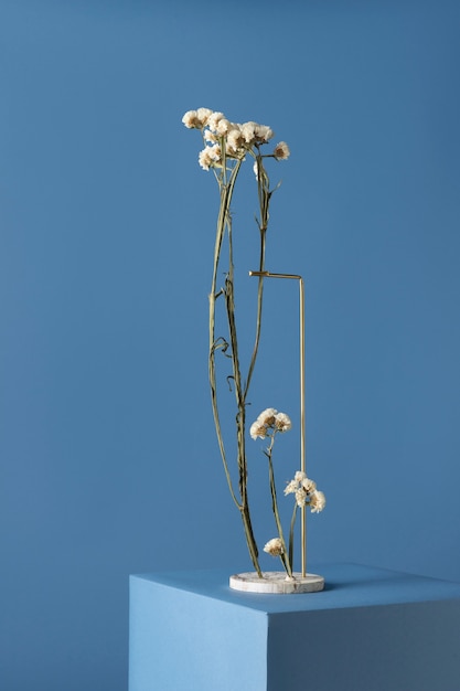 Front view of flower decor on a marble stand