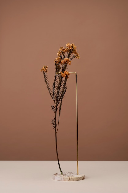 Front view of flower decor on a marble stand