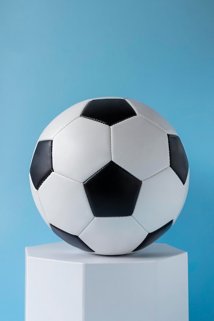 Free photo front view of football and hexagonal shape