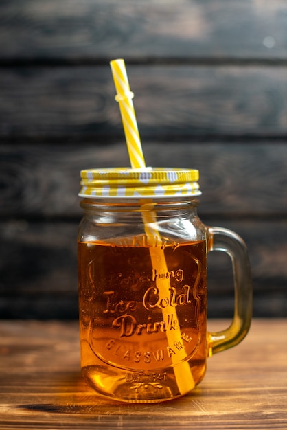 Front view fresh apple juice inside can with straw on dark cocktail fruit drink photo color