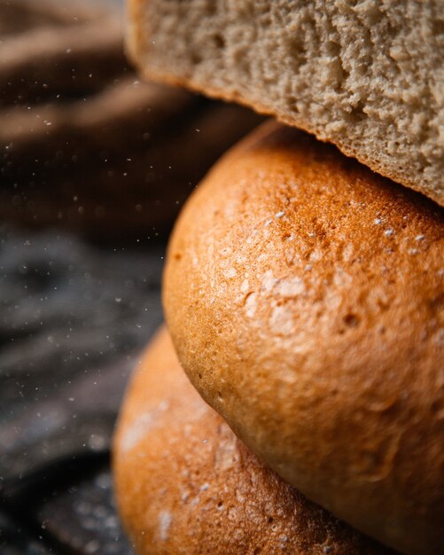 A front view fresh bread baked and tasty food dough bread bun