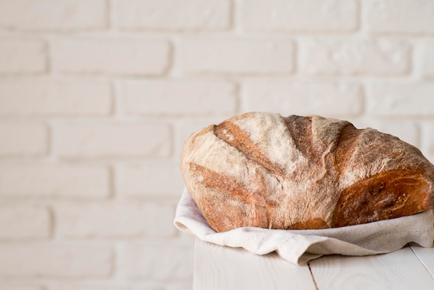 Free photo front view fresh bread on wooden board