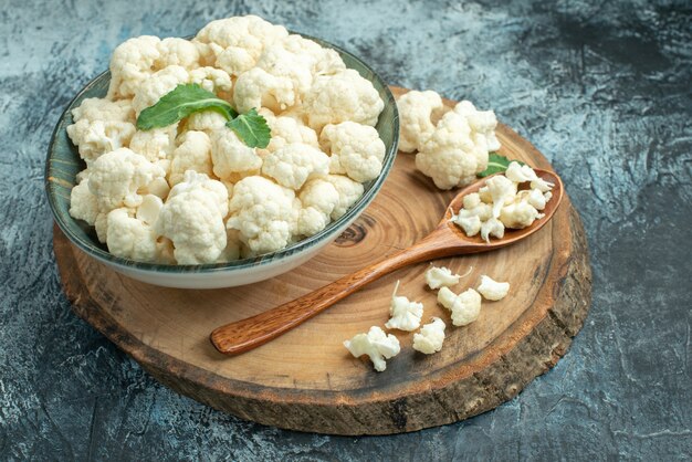 Front view fresh cauliflower inside plate on light-grey surface