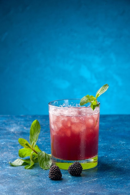 Front view fresh cool lemonade inside little glass with ice on blue background cold juice drink water fruit cocktail color