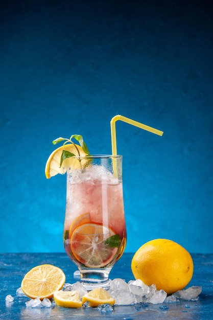 Front view fresh cool lemonade with ice on blue background juice drink water fruit cold cocktail