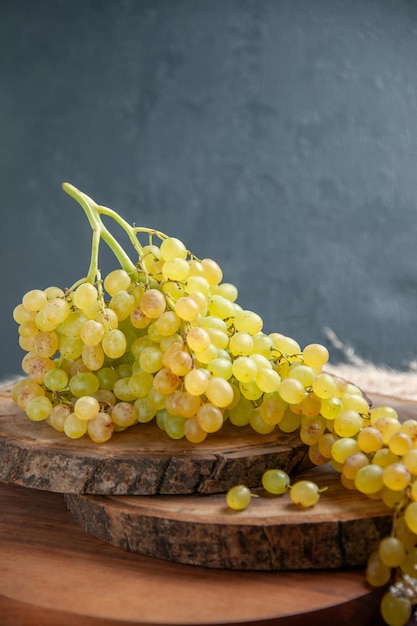 Front view fresh grapes green fruits on dark surface wine grape fruit ripe fresh tree plant