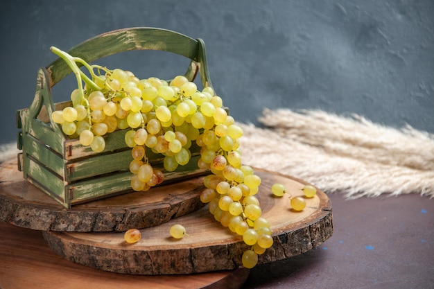 Front view fresh grapes green and ripe fruits on dark desk wine grape fruit ripe fresh tree plant