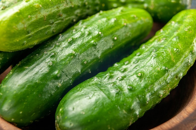 Front view fresh green cucumbers on blue background meal salad health ripe food diet color photo