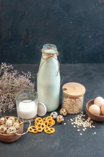 Front view fresh milk with honey and eggs on gray background dairy milk color pie raw breakfast cake