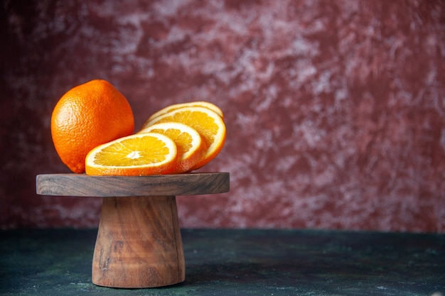 Free Photo front view fresh oranges on dark background fruit citrus color mellow citrus juice tree taste