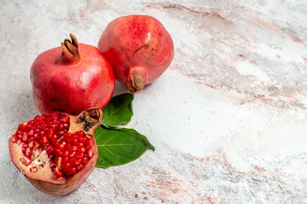 Front view fresh pomegranate on white space